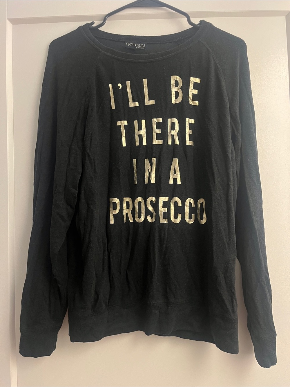 Fifth Sun “I’ll be there in a prosecco” black long sleeve top